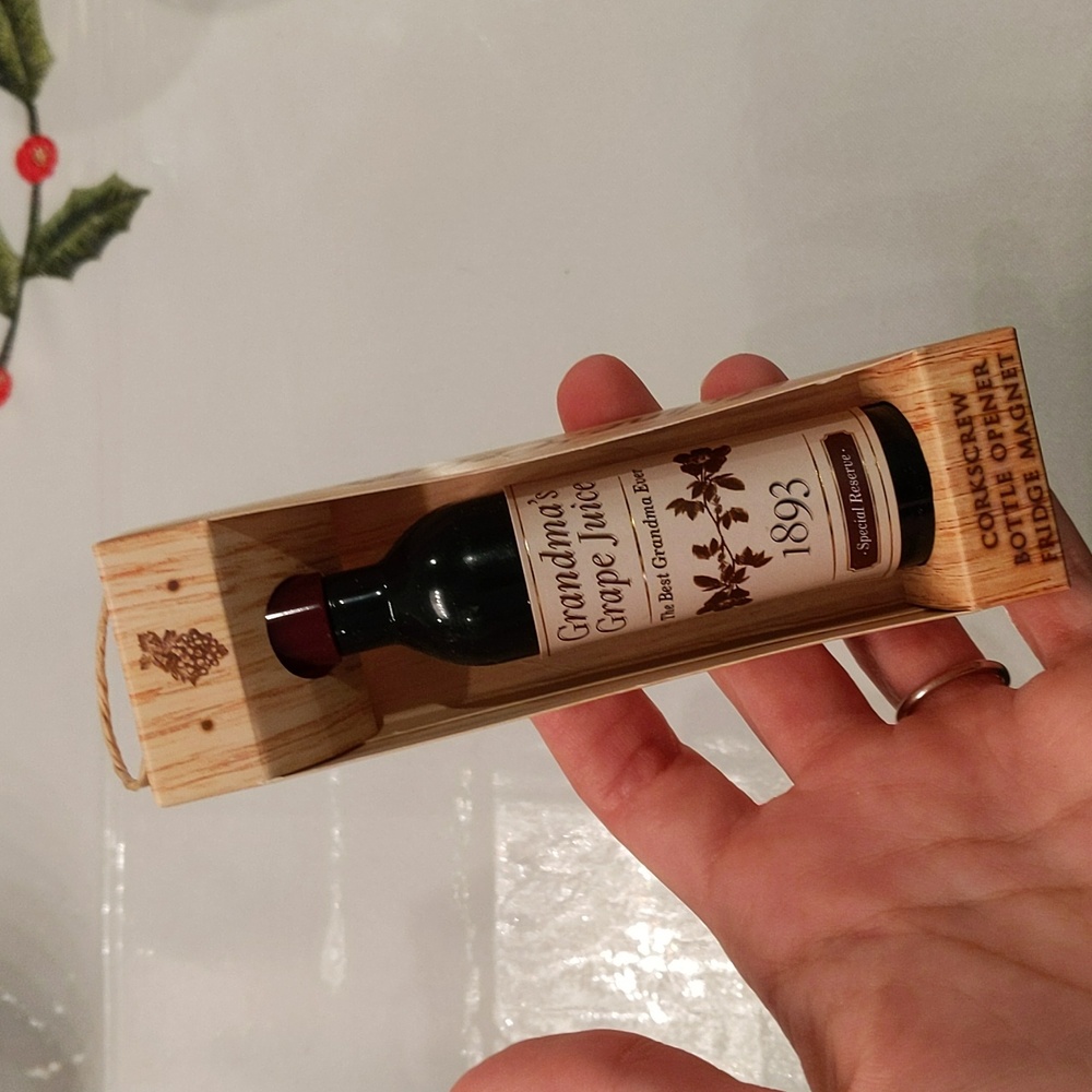 corkscrew Bottle opener Fridge Magnet that looks like a wine